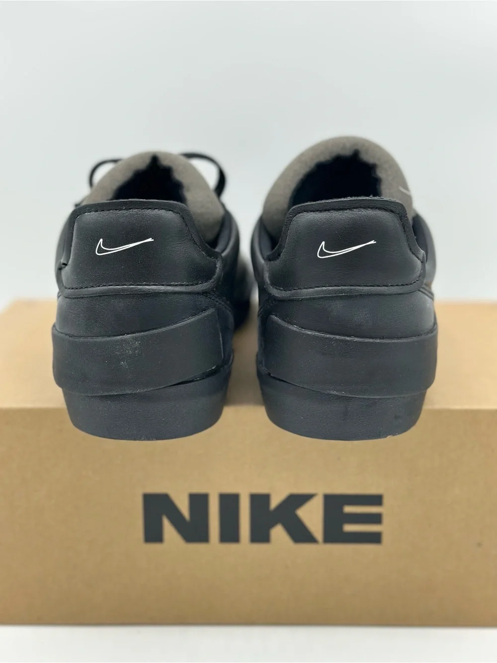 Nike Men’s Black Low-Top Sneakers with Gray Tongue